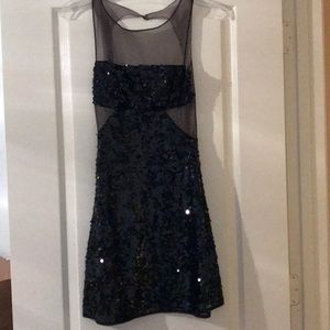 Black sequin dress. Never worn.